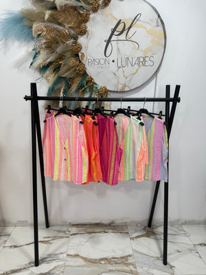 Conjunto chaleco Karol g